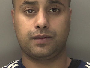 Supporting image for story: Watch: Gun and drug dealer who 'bragged' about his cash and supplies is jailed for over 18 years